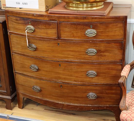 A Regency mahogany bow-fronted chest fitted two short drawers and three long drawers on bracket feet W.106cm